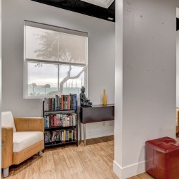 a small reading area next too books